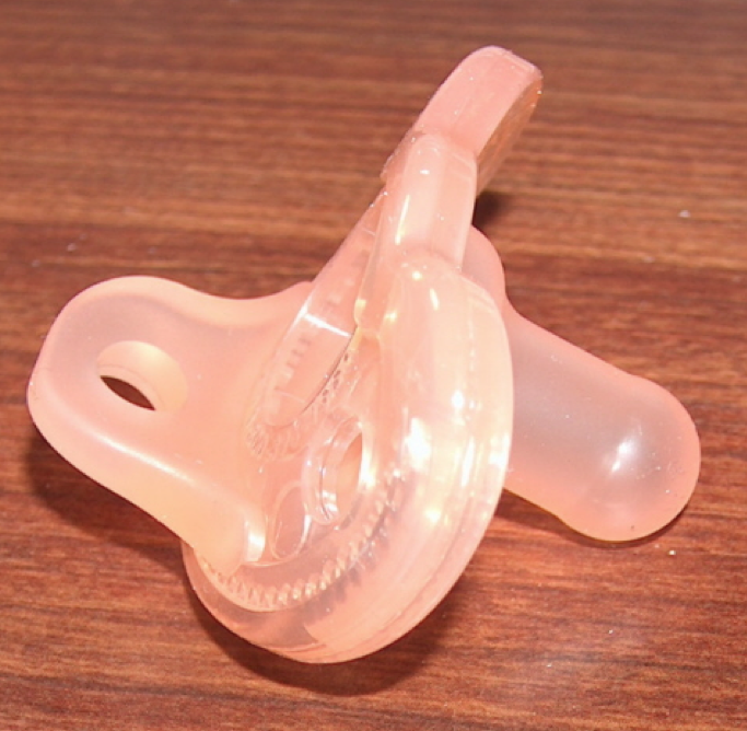 Image of pink hospital pacifier